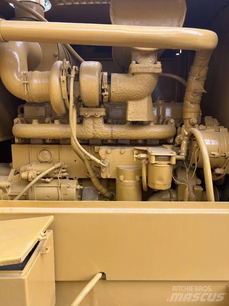 CAT 140 Niveleuse