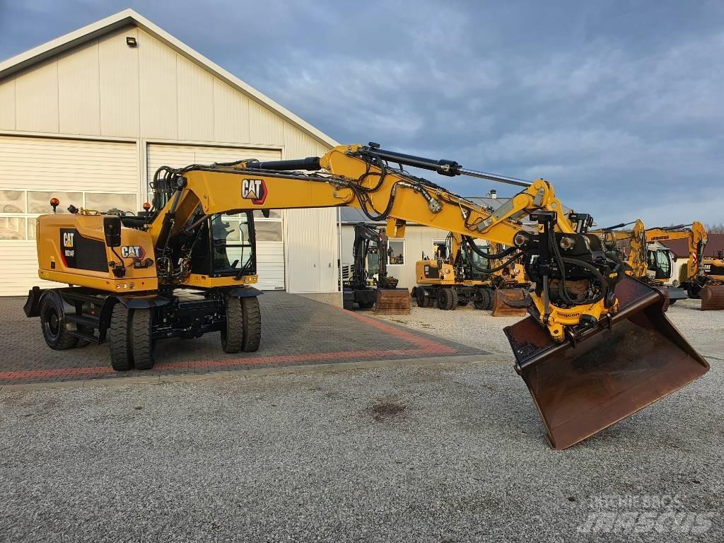 CAT M 314 F Pelle sur pneus