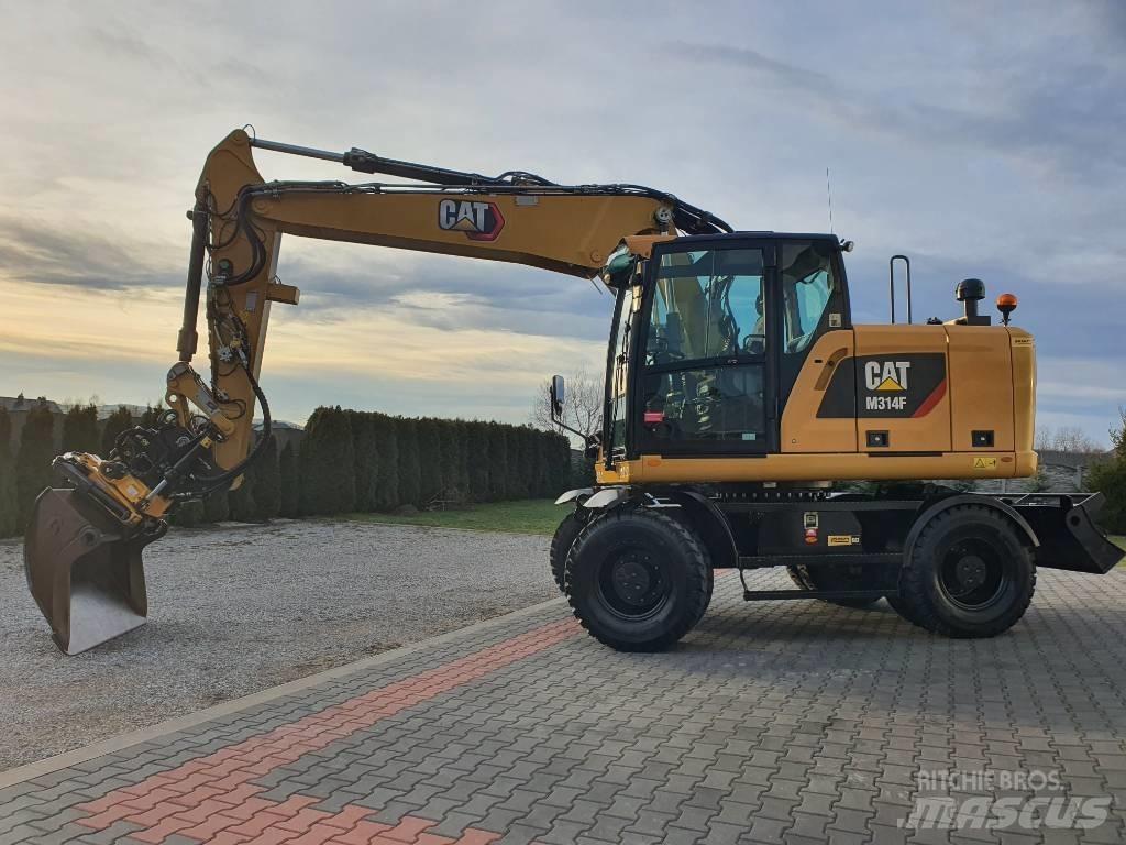 CAT M 314 F Pelle sur pneus