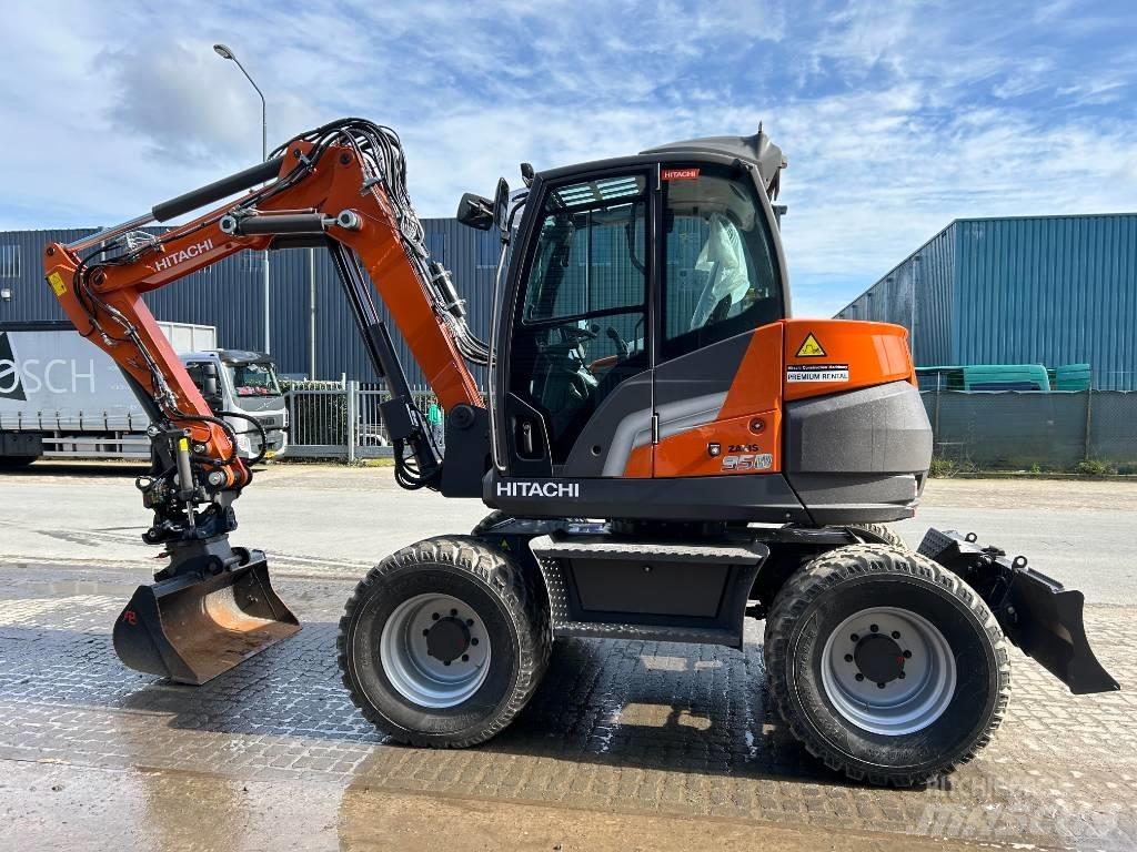 Hitachi ZX95W Pelle sur pneus