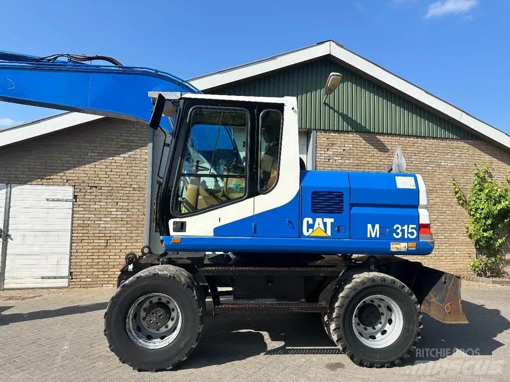 CAT M315 Pelle sur pneus