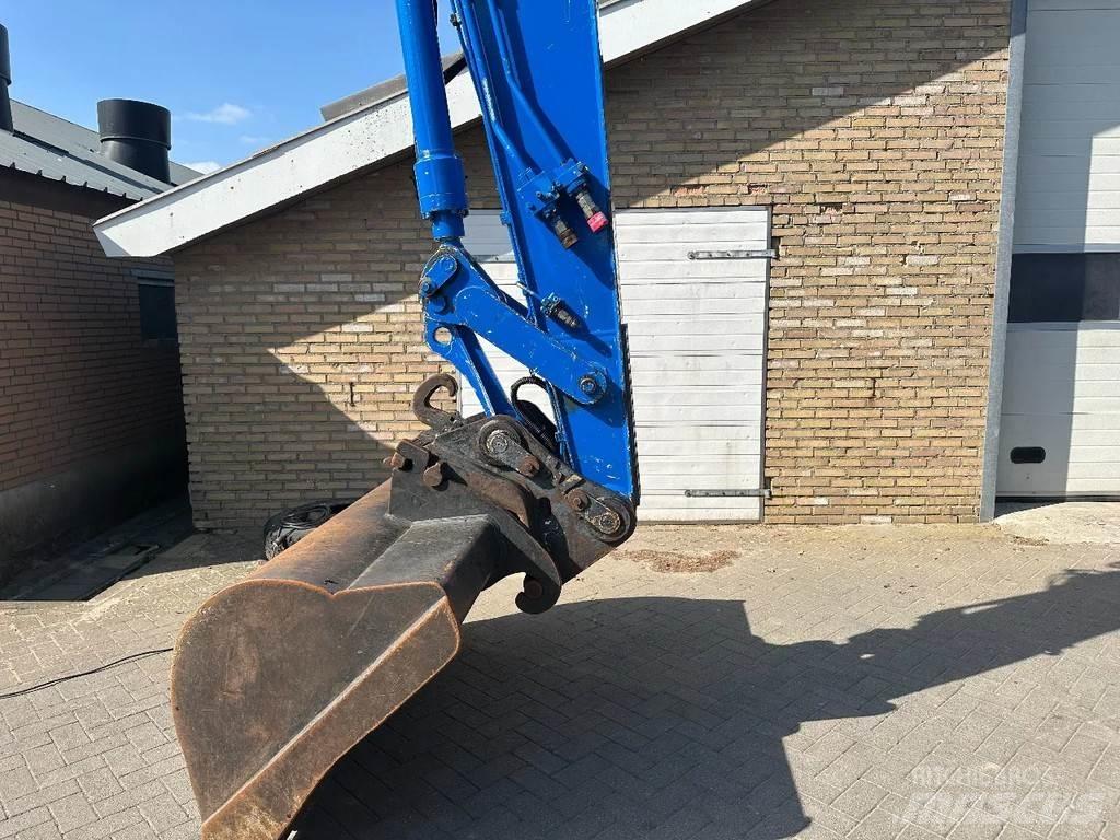 CAT M315 Pelle sur pneus