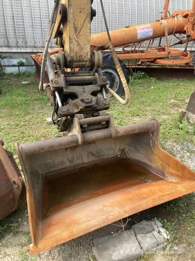 CAT M 312 Pelle sur pneus