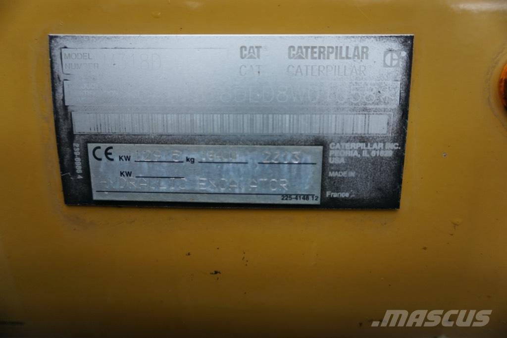 CAT M 318 D Pelle sur pneus