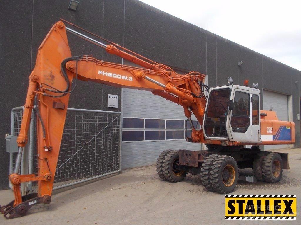 Hitachi 200W Pelle sur pneus