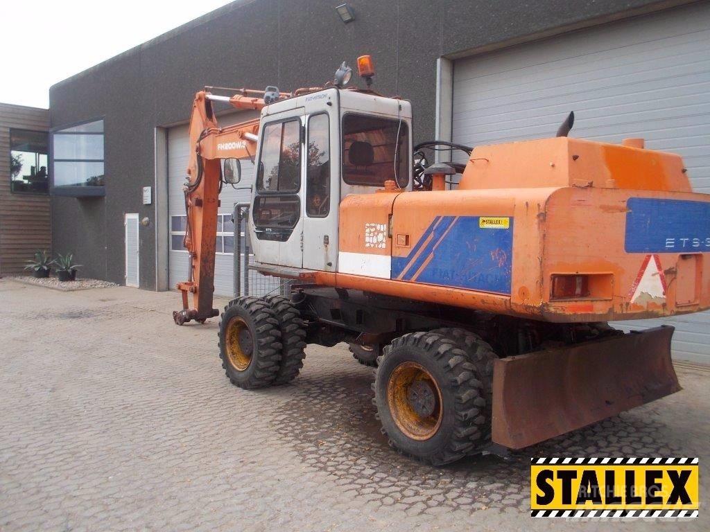 Hitachi 200W Pelle sur pneus