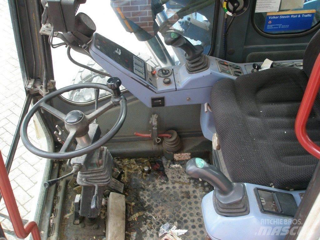 Atlas 1404 Pelle sur pneus