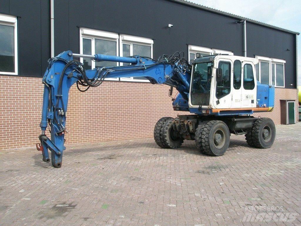 Atlas 1404 Pelle sur pneus