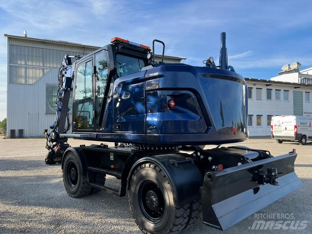CAT M319 NG Pelle sur pneus