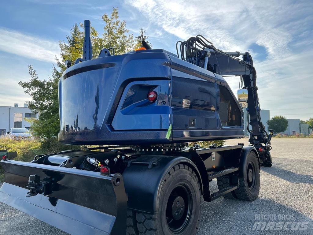 CAT M319 NG Pelle sur pneus