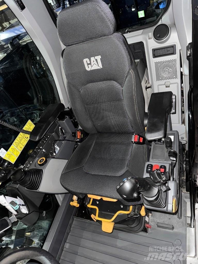 CAT M319 NG Pelle sur pneus