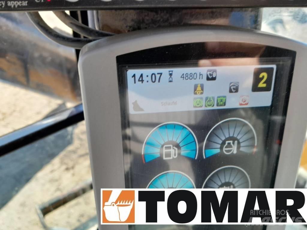 CAT M 314 F Pelle sur pneus