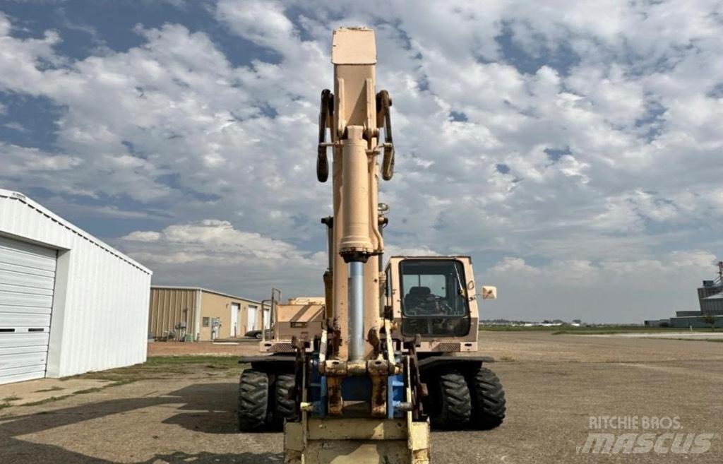 John Deere 595 Pelle sur pneus