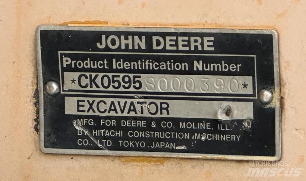 John Deere 595 Pelle sur pneus
