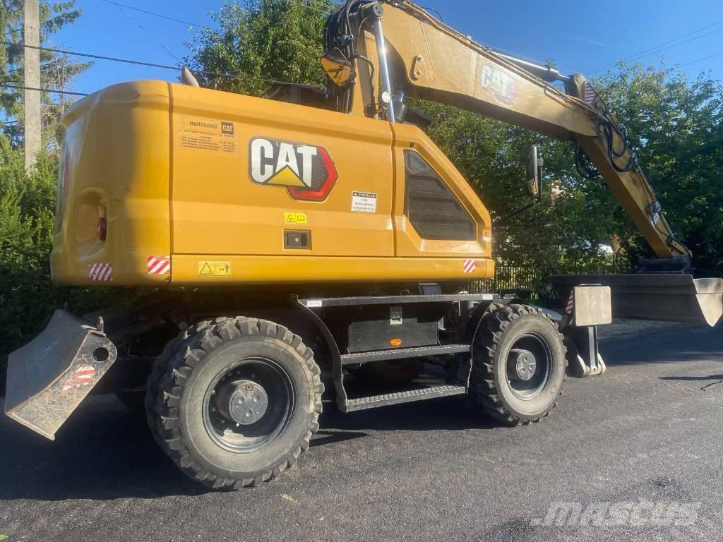CAT M 314 Pelle sur pneus