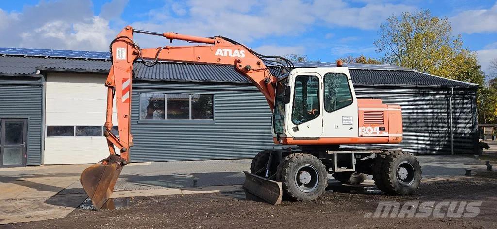 Atlas 1304 Pelle sur pneus