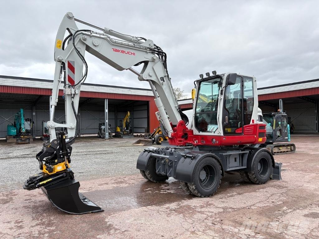 Takeuchi TB395W Pelle sur pneus
