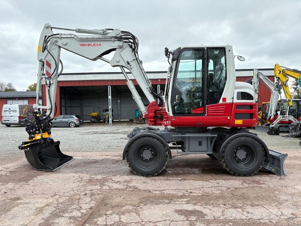 Takeuchi TB395W Pelle sur pneus