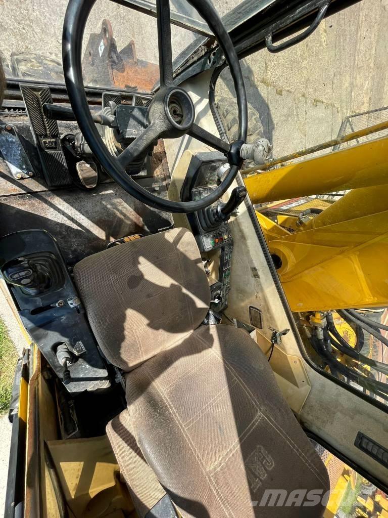 CAT M 315 Pelle sur pneus