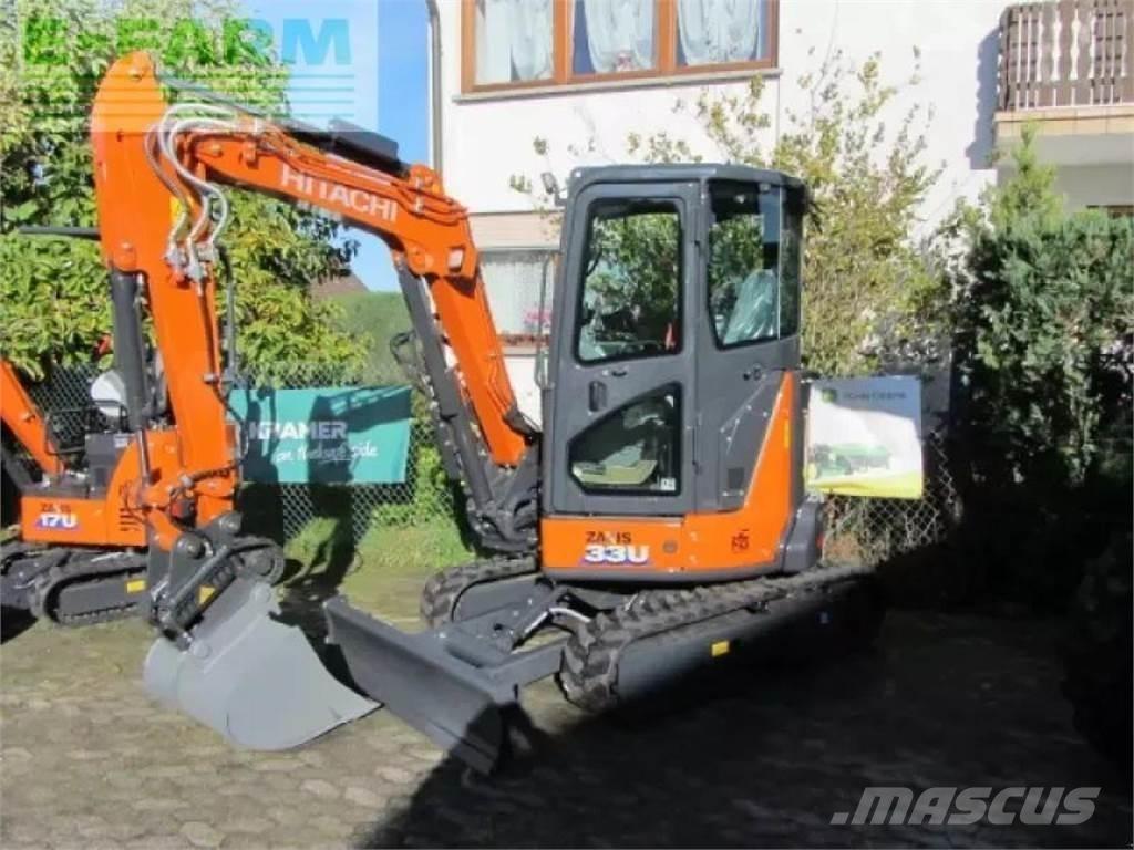 Hitachi zx 33 u-6 Pelle sur pneus