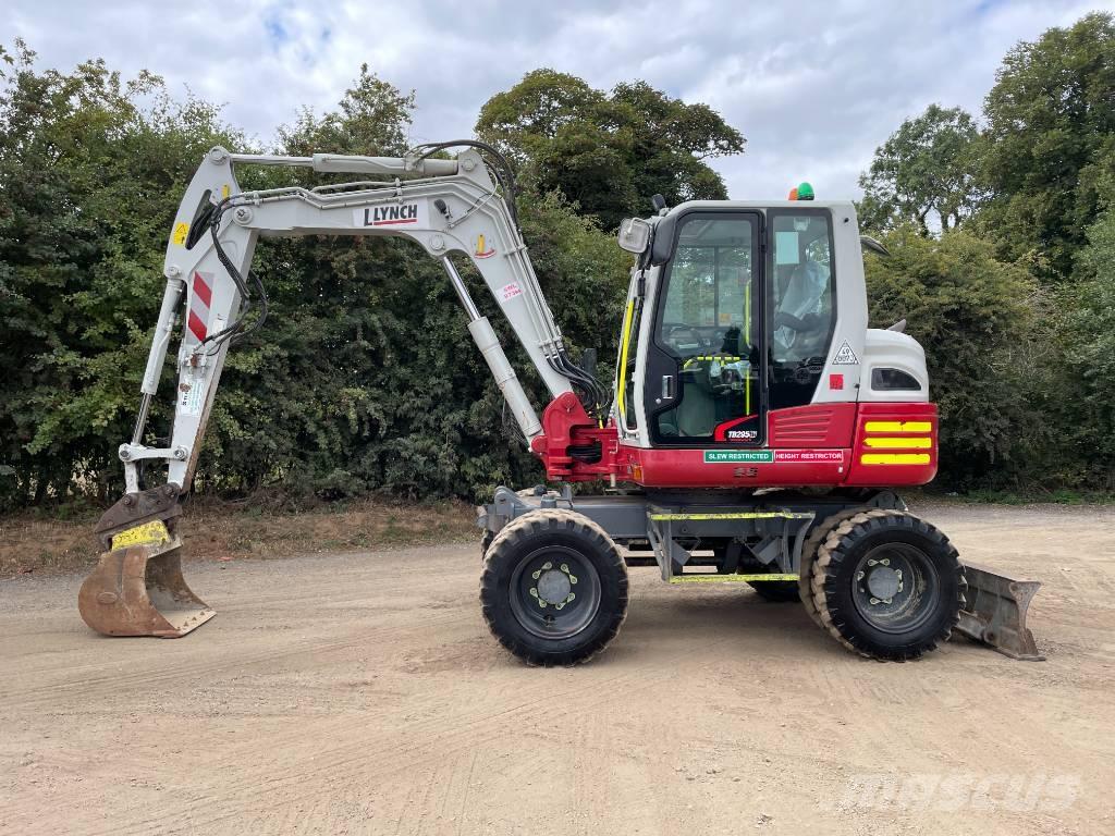 Takeuchi TB 295 W Pelle sur pneus