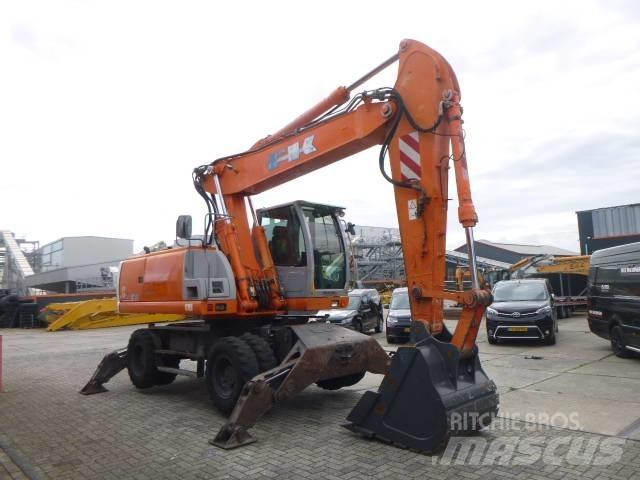Fiat-Kobelco E215W Pelle sur pneus
