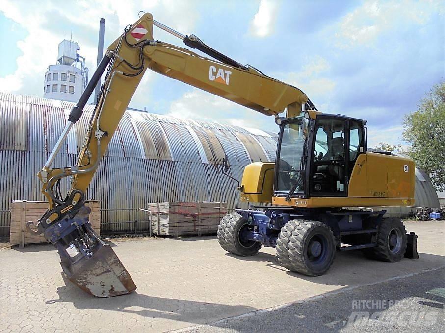 CAT M 320 F Pelle sur pneus