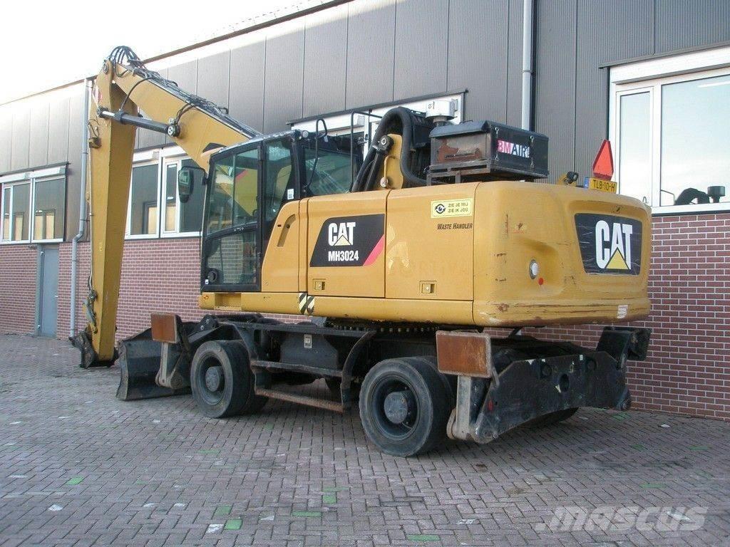 CAT MH3024 Pelle à déchets