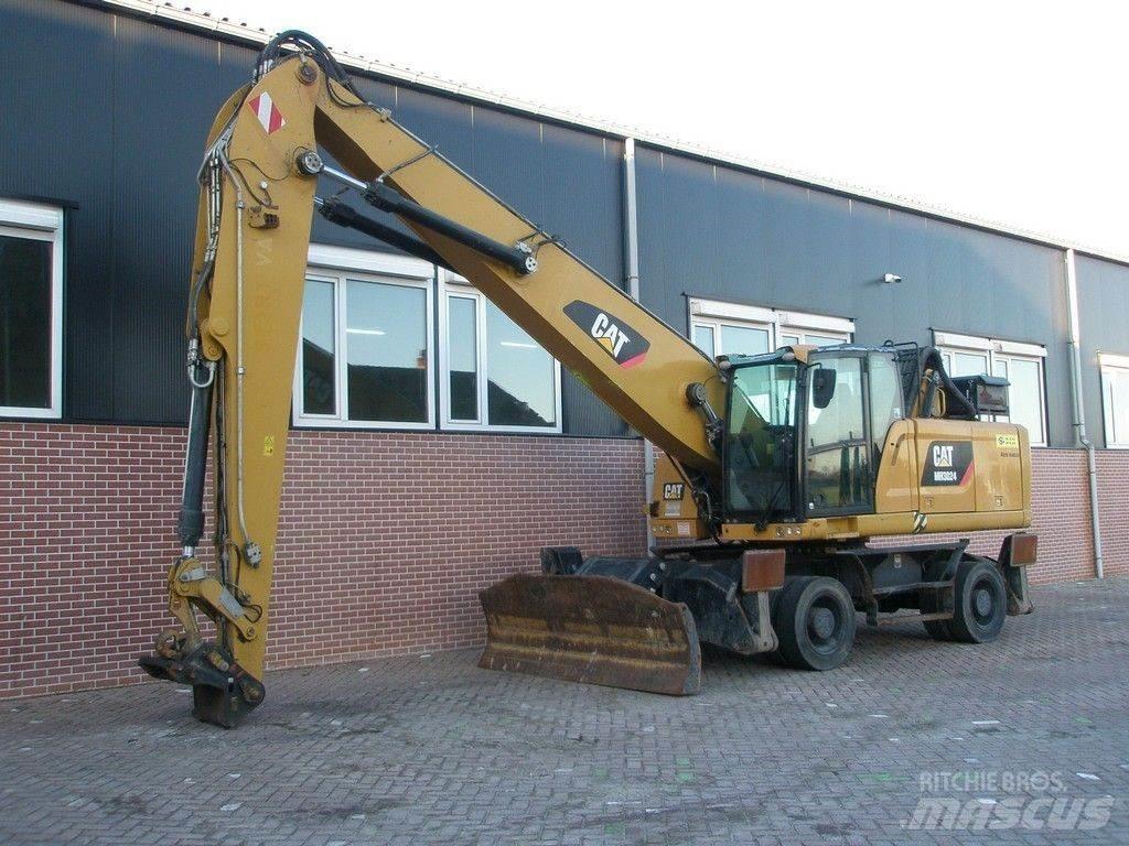 CAT MH3024 Pelle à déchets