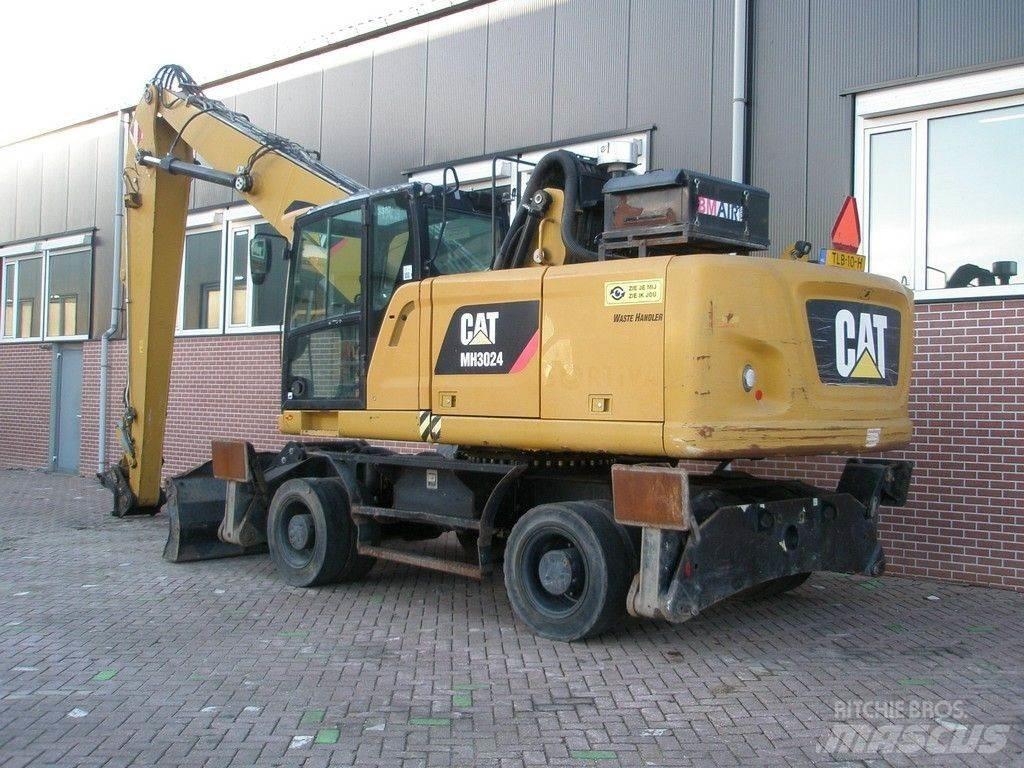 CAT MH3024 Pelle à déchets