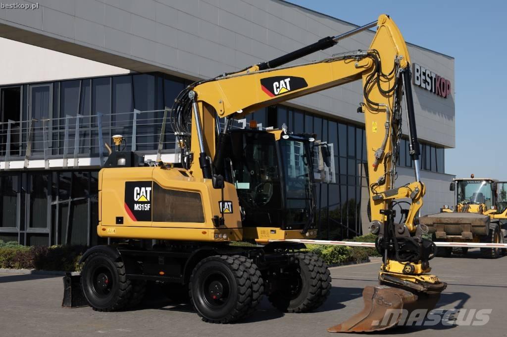 CAT M 315 F Pelle sur pneus