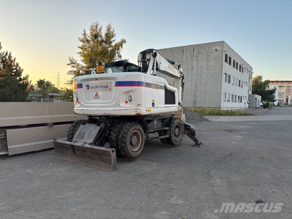 CAT m314f Pelle sur pneus