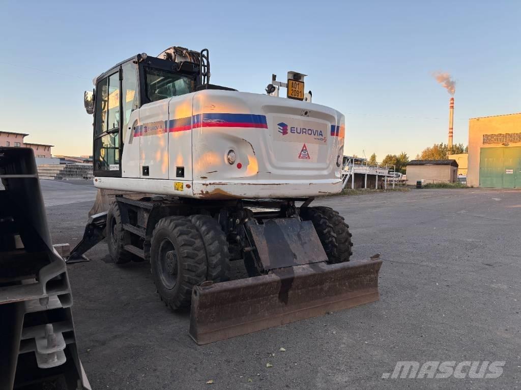 CAT m314f Pelle sur pneus
