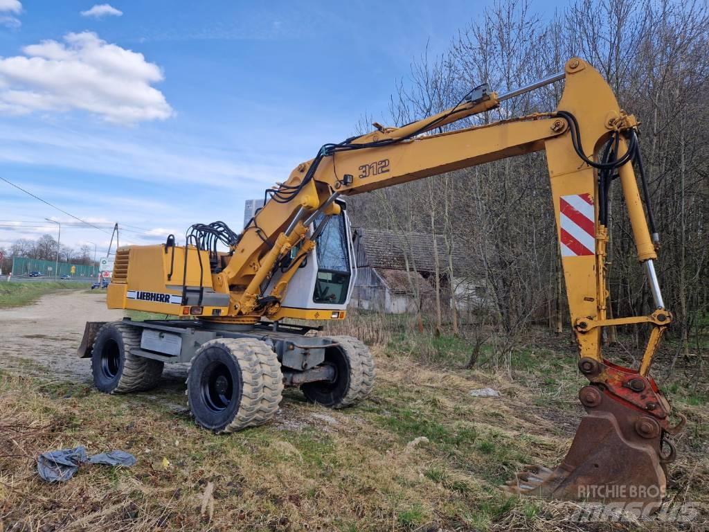 Liebherr 312 A Pelle sur pneus