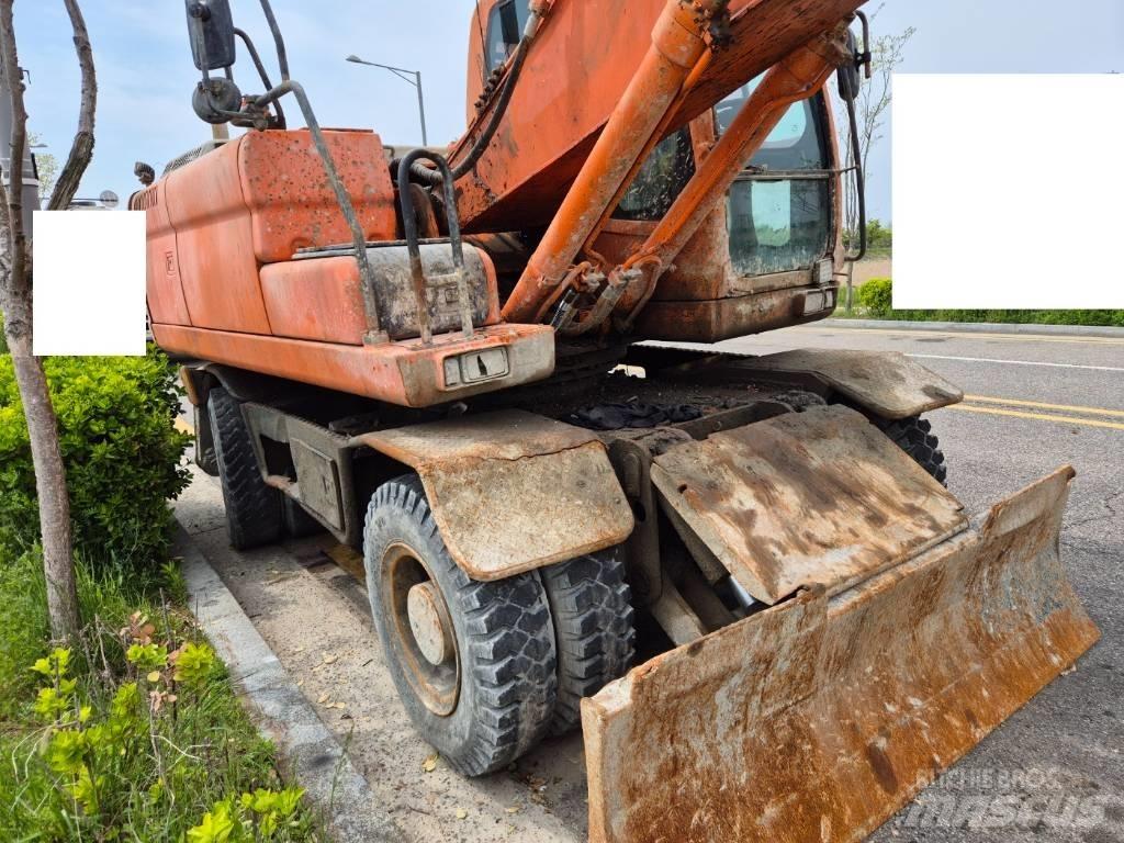 Doosan DX210WA Pelle sur pneus