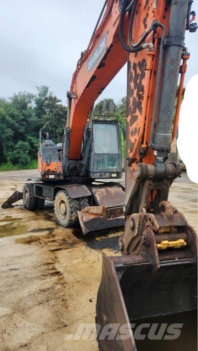 Doosan DX 210 W Pelle sur pneus