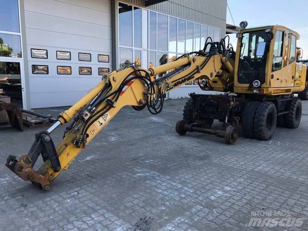 Atlas AB1404K Pelle sur pneus