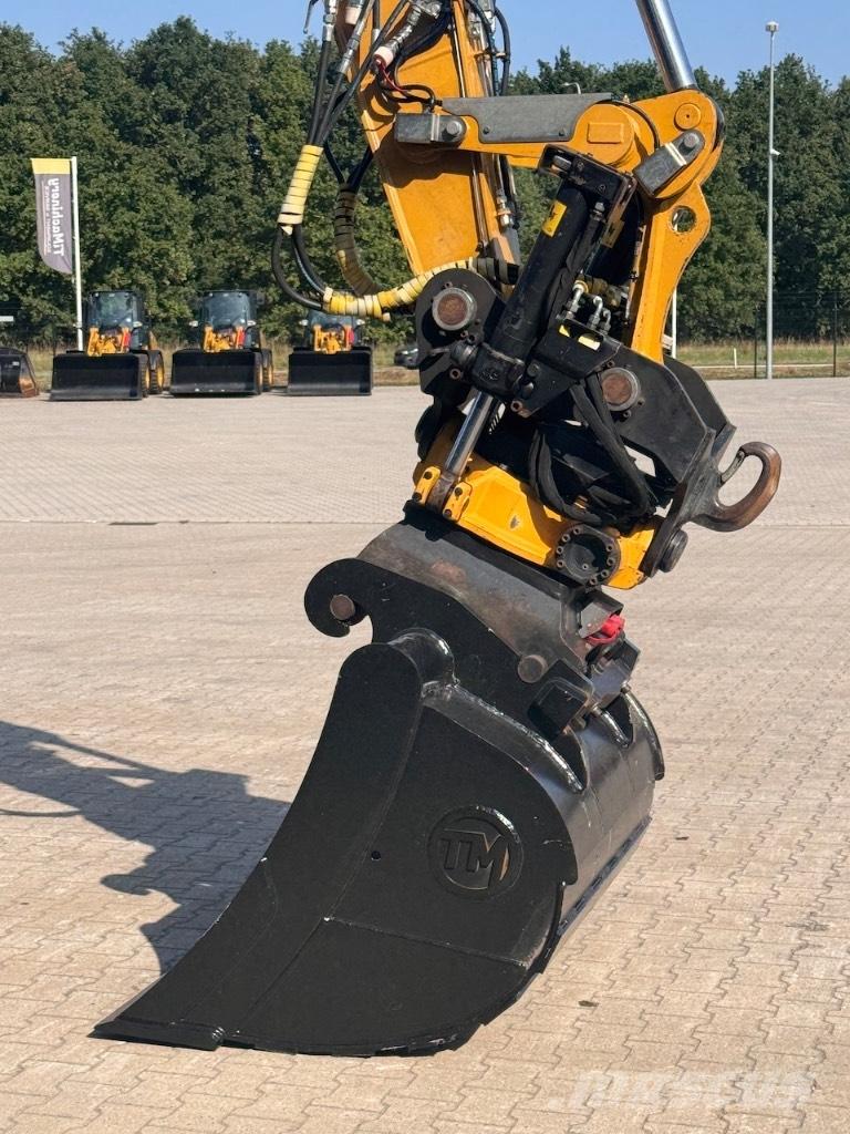 CAT M316F Pelle sur pneus