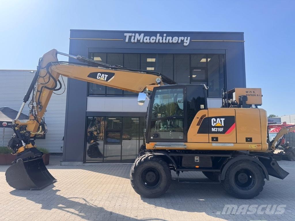 CAT M316F Pelle sur pneus