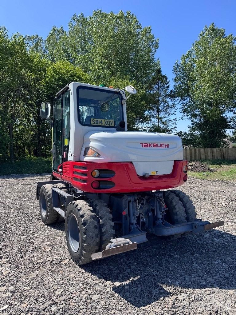 Takeuchi TB 295 W Pelle sur pneus