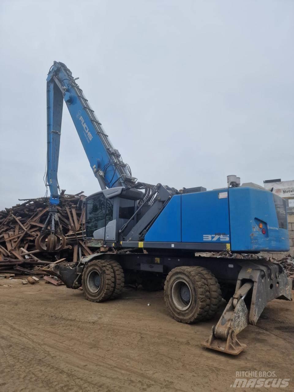Fuchs MHL 375 S5 Pelle sur pneus