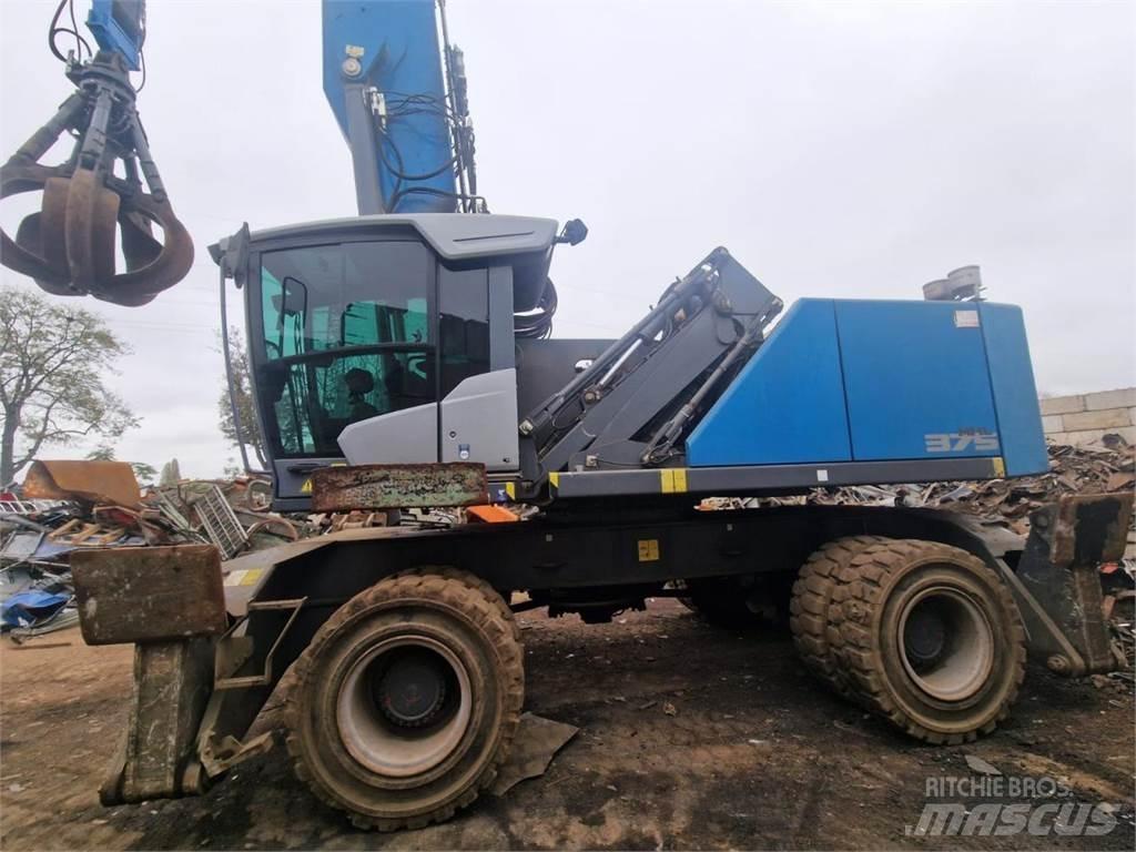 Fuchs MHL 375 S5 Pelle sur pneus