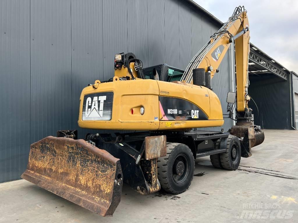 CAT M318D MH Pelle à déchets