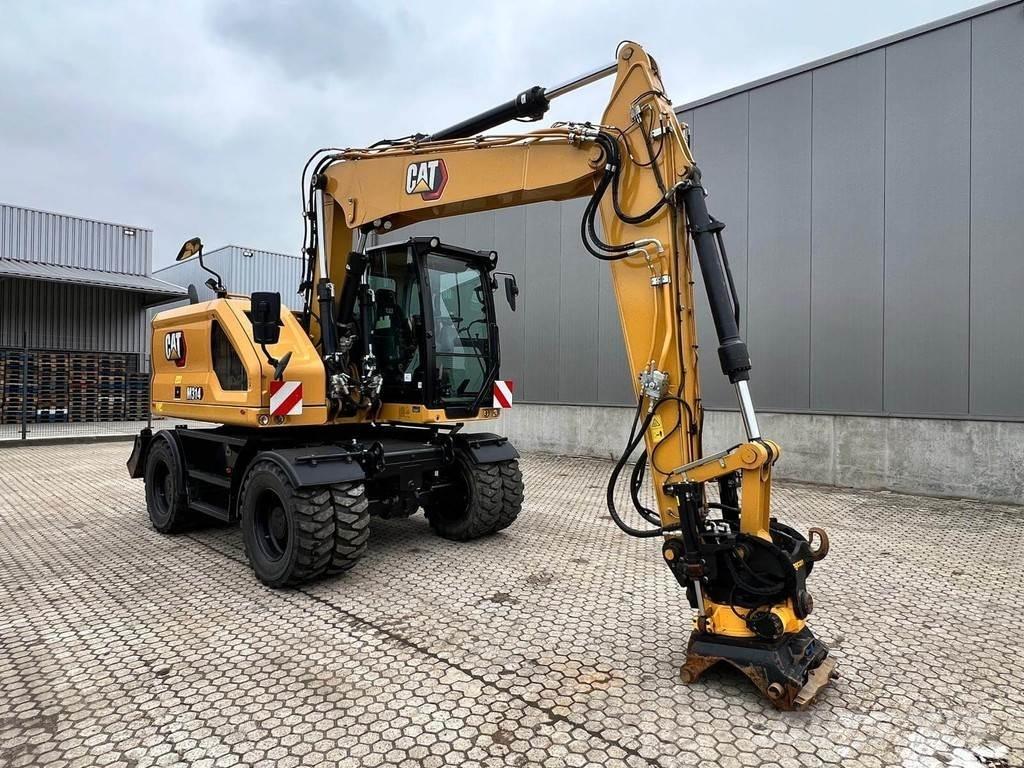 CAT M314-07 Pelle sur pneus