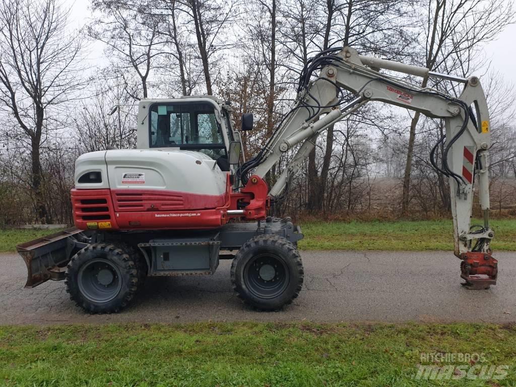 Takeuchi TB 295 W Pelle sur pneus
