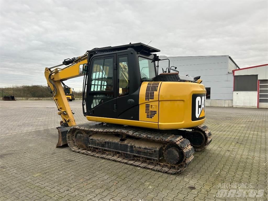 CAT 311 F L RR Pelle sur pneus