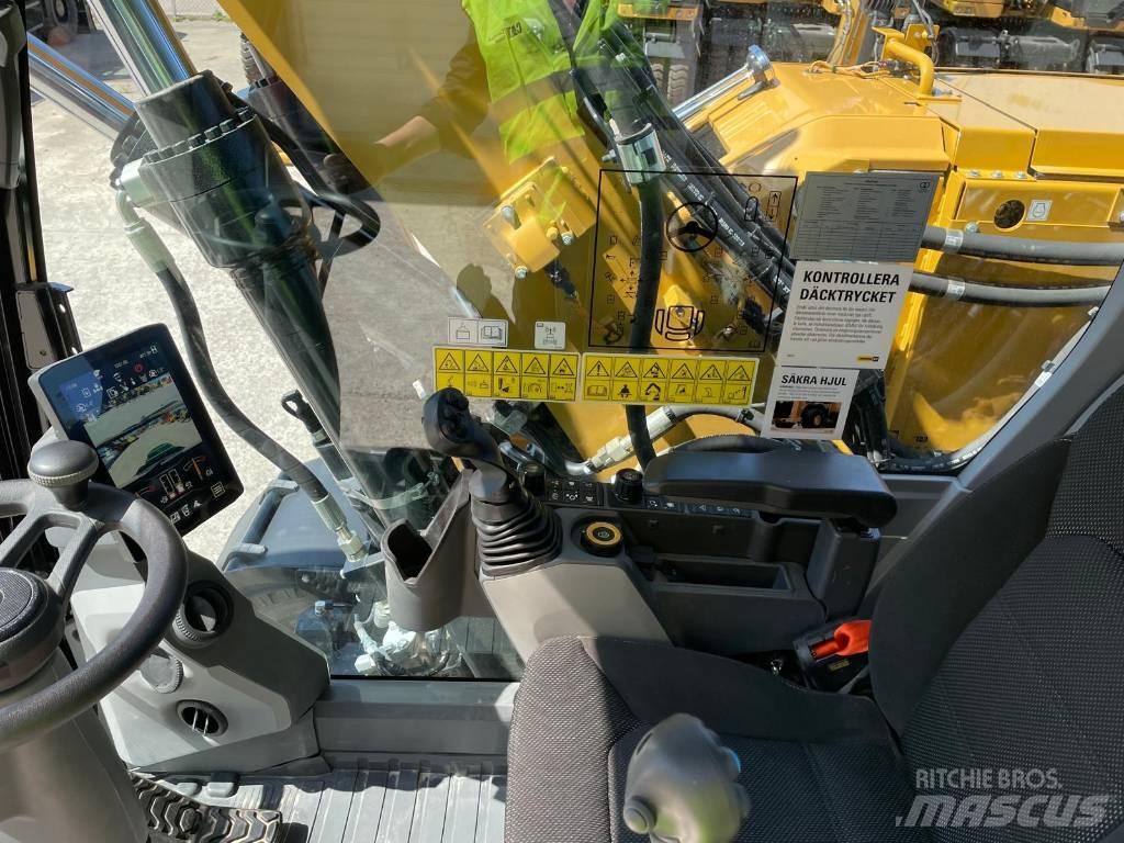CAT M314 Pelle sur pneus