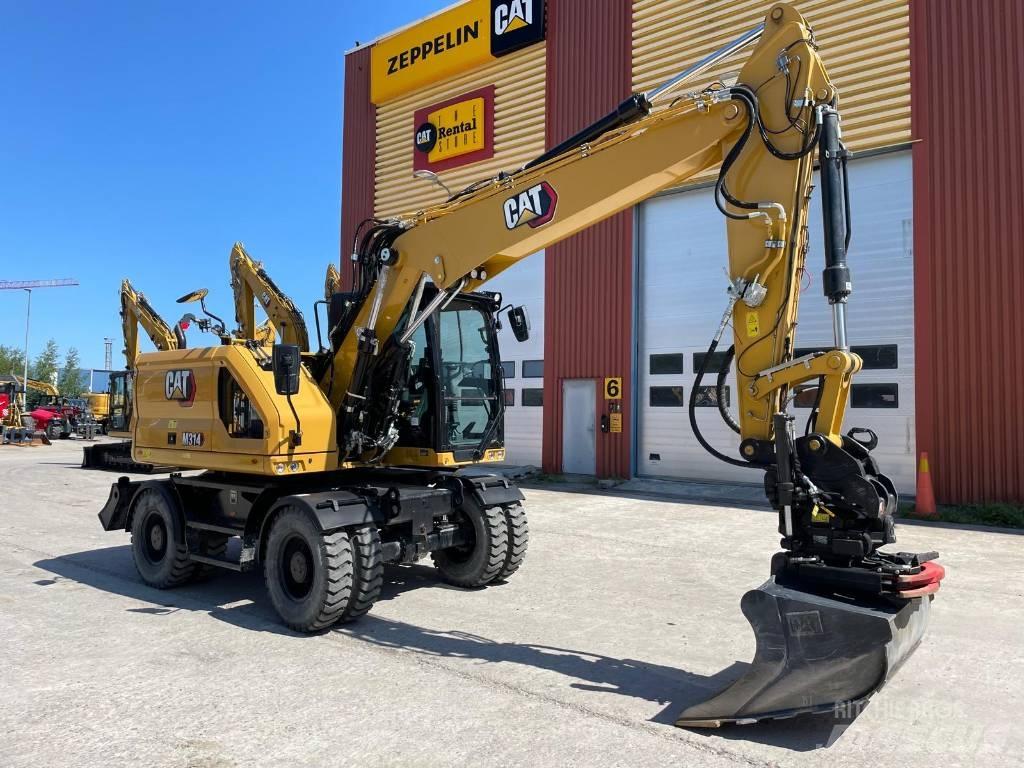 CAT M314 Pelle sur pneus