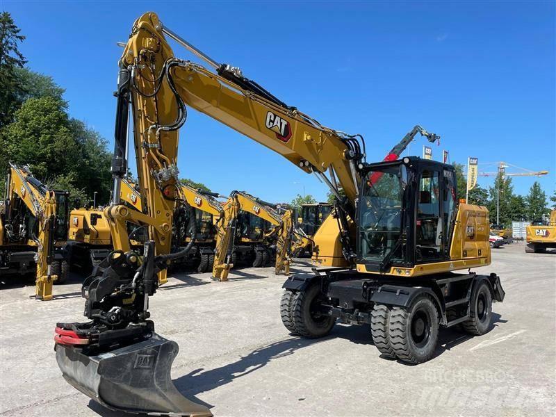 CAT M314 Pelle sur pneus