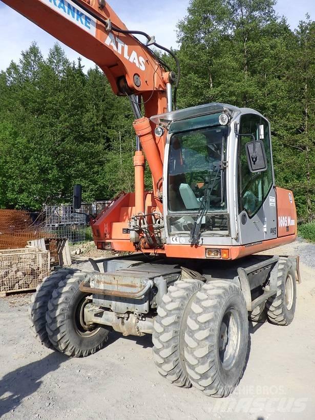 Atlas 1605 M Pelle sur pneus